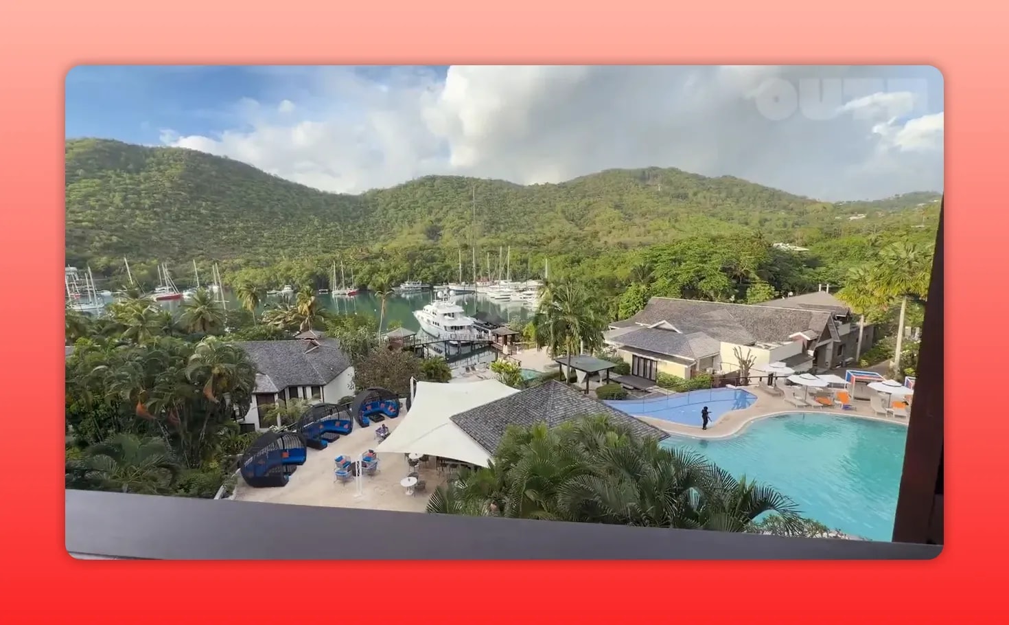 View from Zoëtry Marigot Bay balcony over Marigot Bay marina, pool, and lush St. Lucia hills